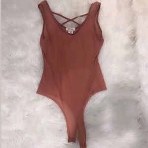 Nasty Gal, sheer pinkish-mauve colored body suit